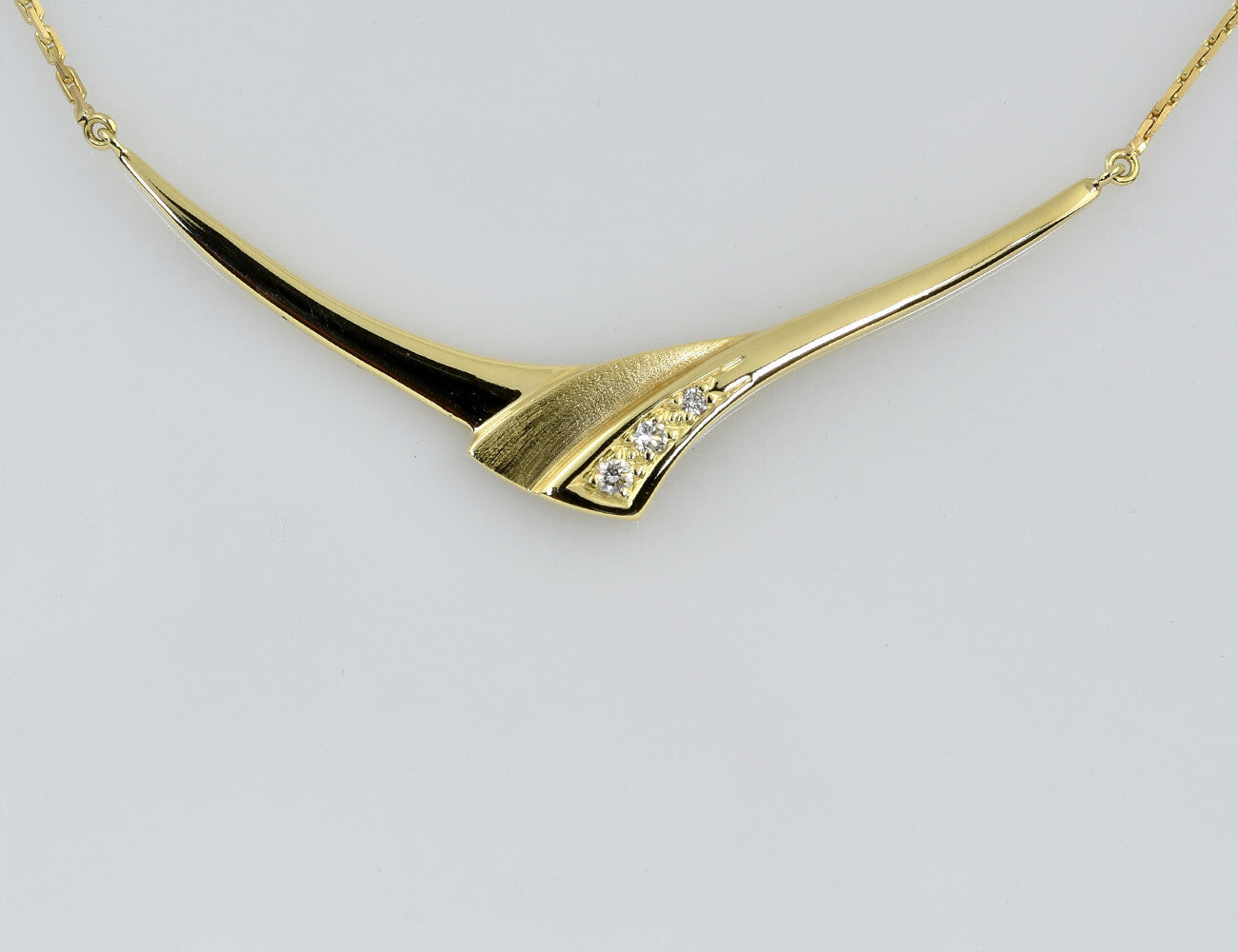 Kette 585/000 14 K Gelbgold Collier 3 Brillanten zus. 0,08 ct, 42 cm lang