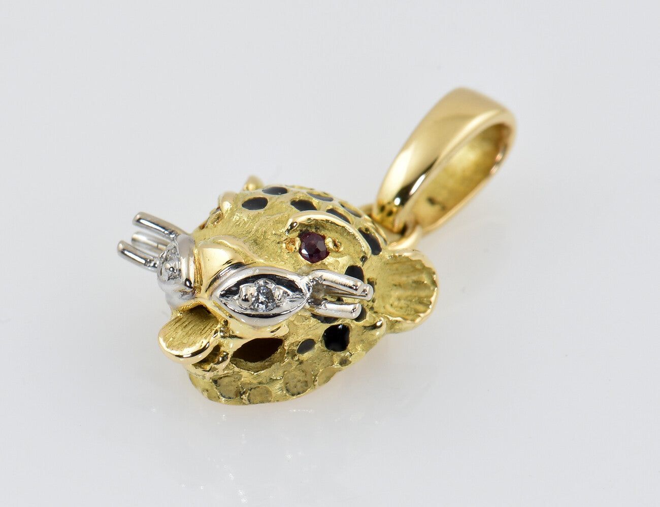 Anhänger Panter 750/000 18 K Gelbgold 2 Diamanten zus. 0,02 ct, Rubin