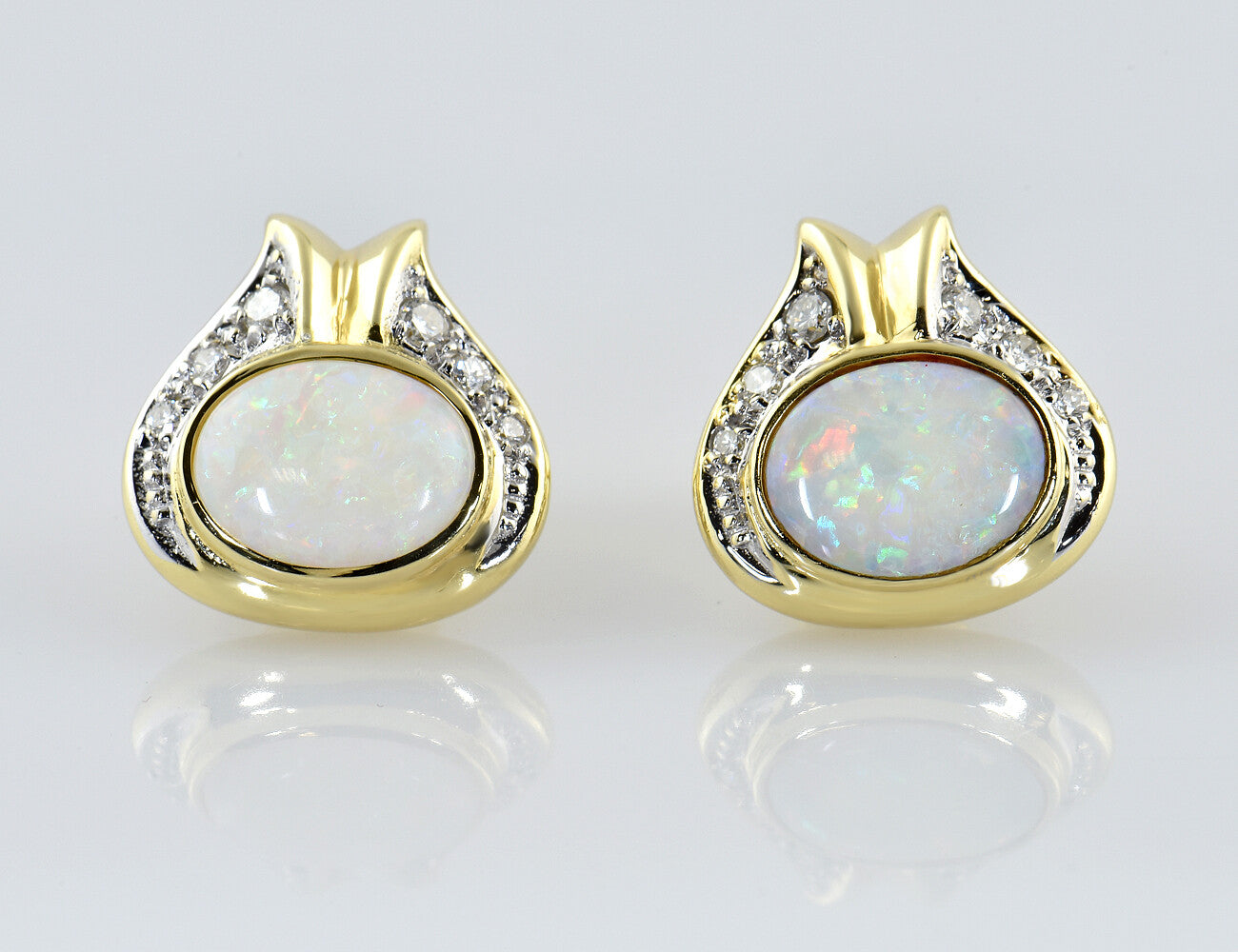 Ohrstecker Opal 585/000 14 K Gelbgold 12 Diamanten zus. 0,18 ct
