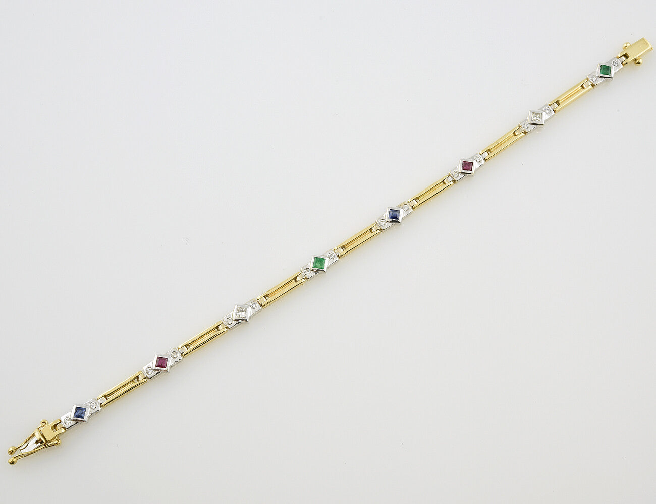 Armband Rubin, Saphir, Smaragd 18,5 cm 750 Gelbgold  18 Brillanten zus. 0,45 ct