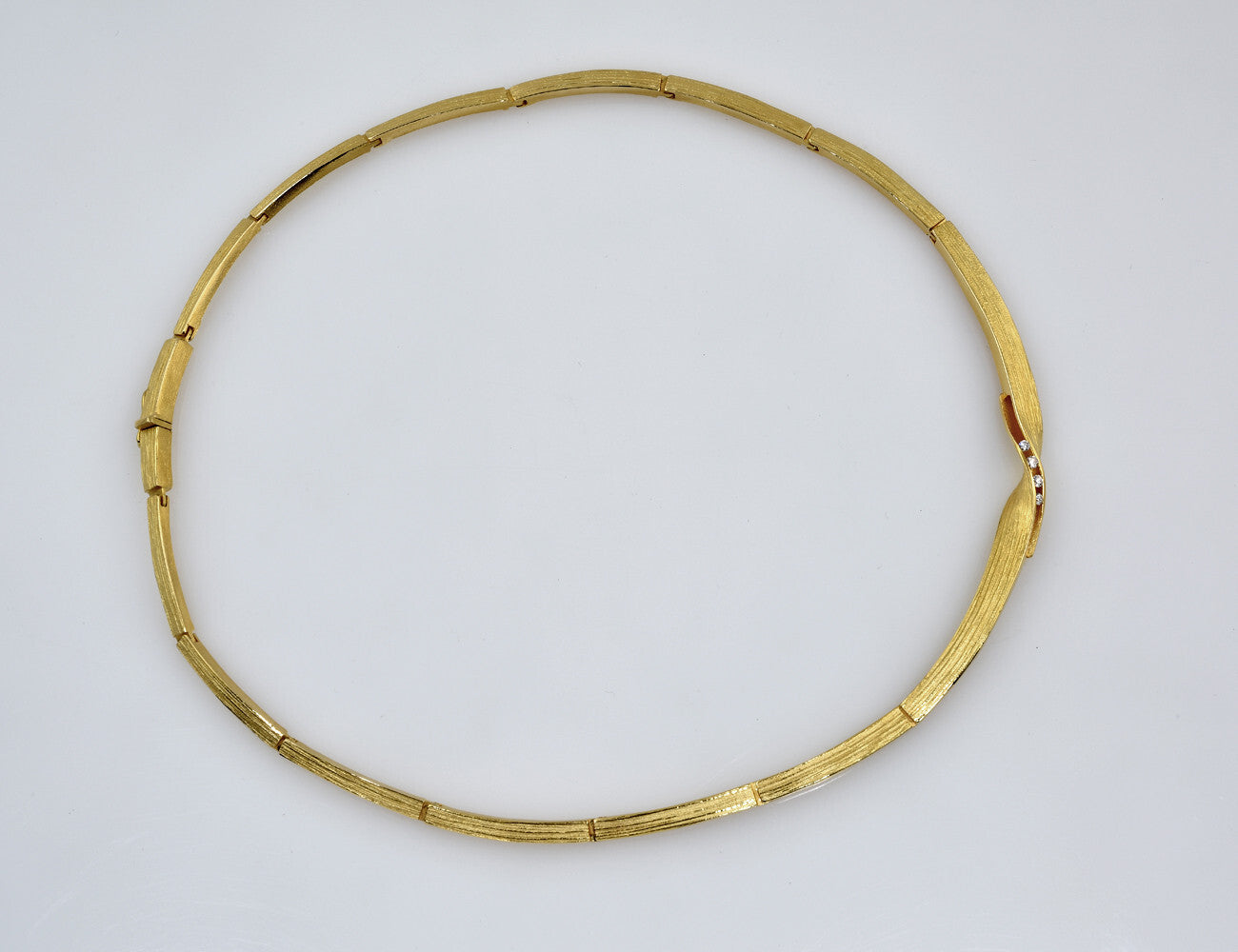 Collier Diamant 750/000 18 K Gelbgold, 4 Brillanten zus. 0,12 ct