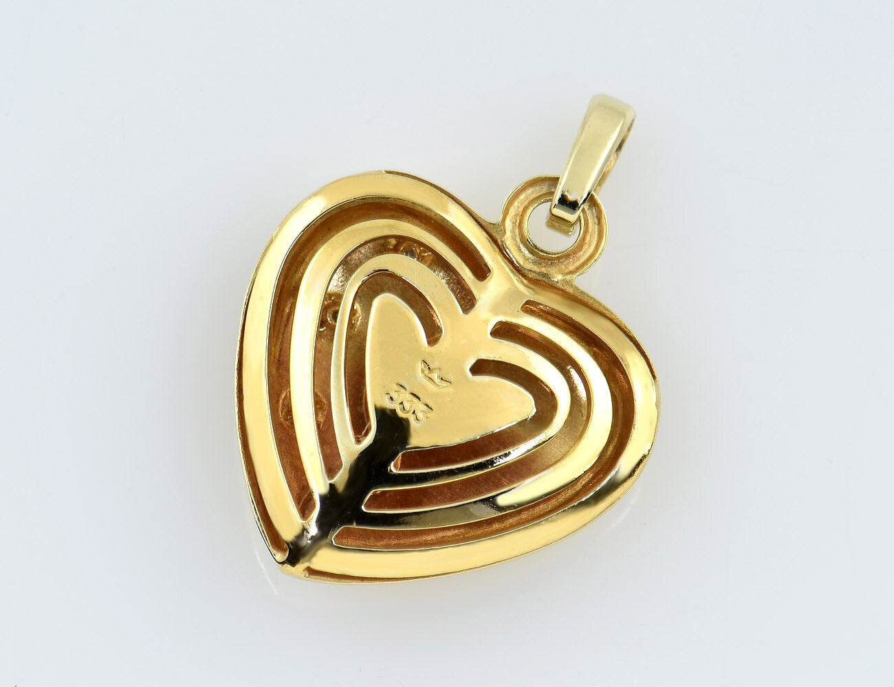 Anhänger Herz 333/000 8 K Gelbgold 3 Diamanten zus. 0,02 ct