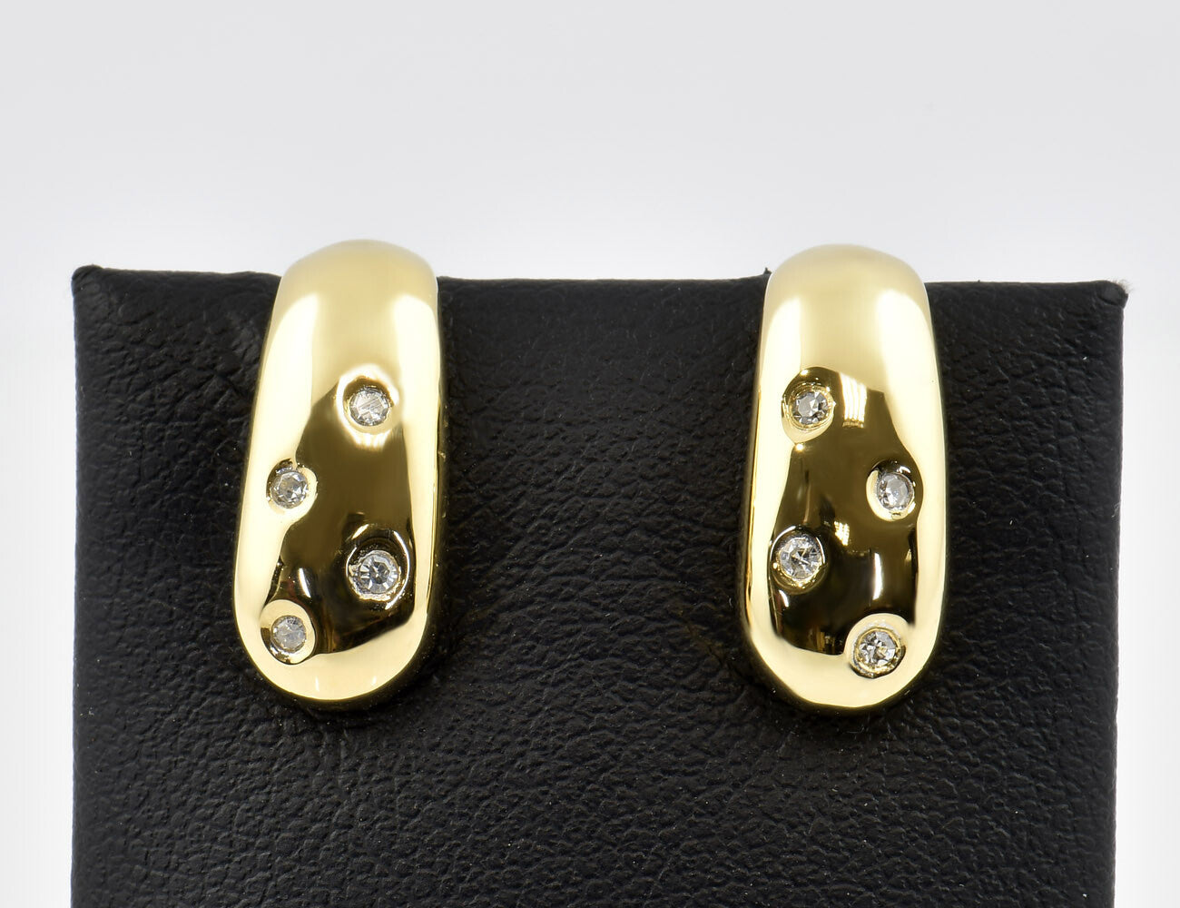 Ohrstecker 750/000 18 K Gelbgold 8 Diamanten zus. 0,10 ct