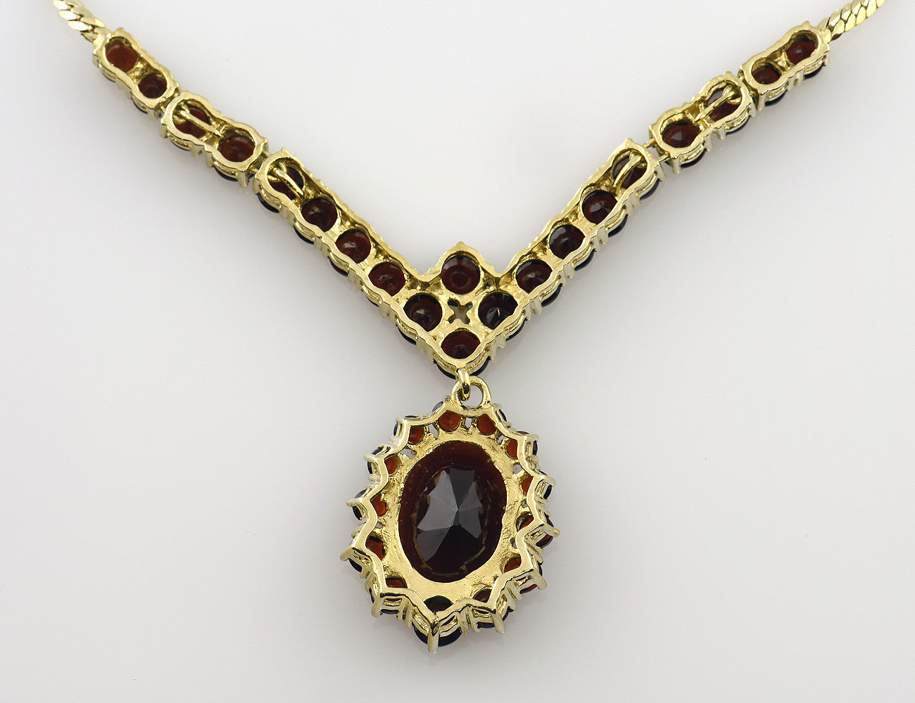 Kette Granat 333/000 8 K Gelbgold Collier, 42 cm lang