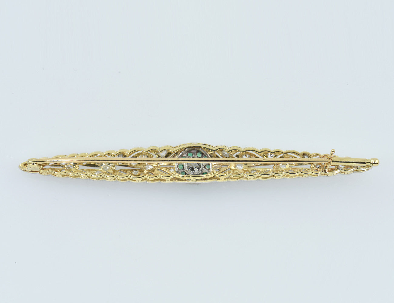 Antike Brosche 585/000 14 K Gelbgold, Smaragad, 45 Diamanten zus. 0,70 ct