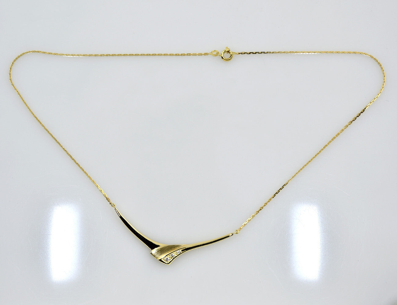 Kette 585/000 14 K Gelbgold Collier 3 Brillanten zus. 0,08 ct, 42 cm lang