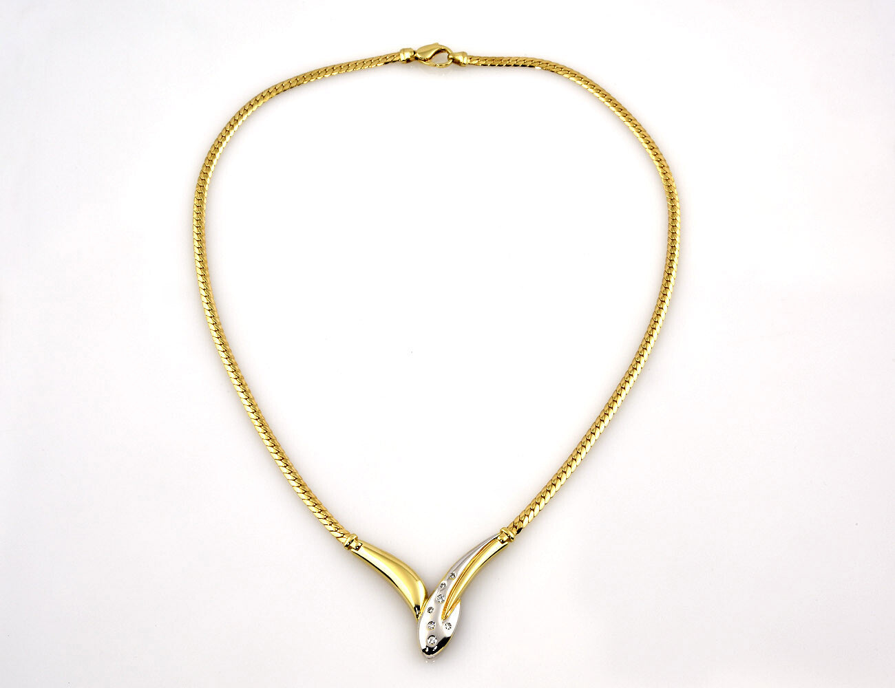 Kette 585/000 14 K Gelbgold Collier 7 Brillanten zus. 0,15 ct, 46 cm lang
