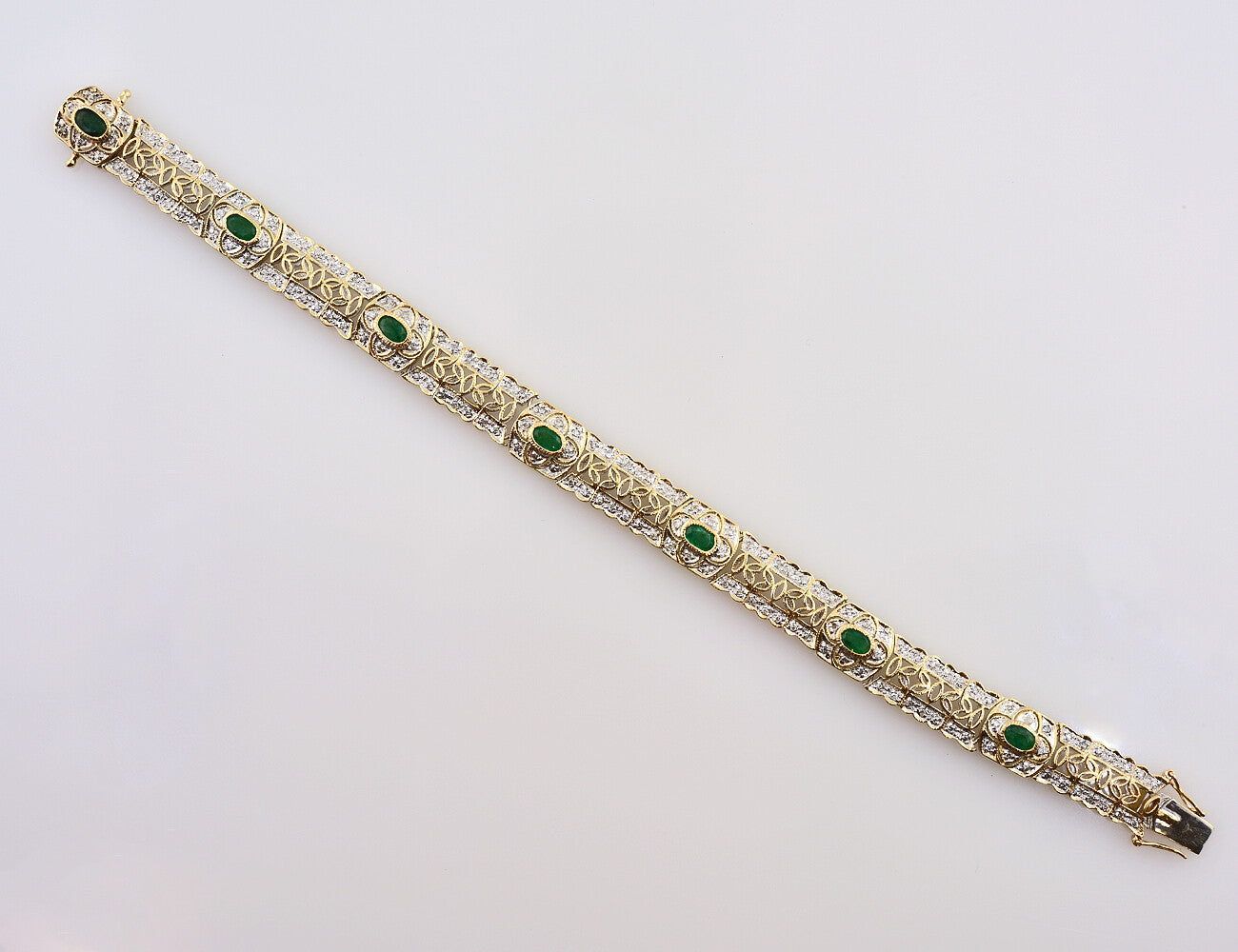 Armband Smaragd 585/000 14 K Gelbgold 154 Diamanten zus. 1,50 ct, 18,50 cm lang