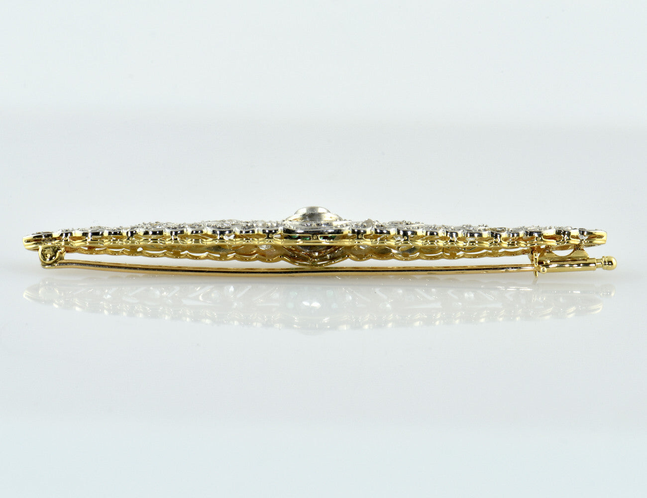 Antike Brosche 585/000 14 K Gelbgold, Smaragad, 45 Diamanten zus. 0,70 ct