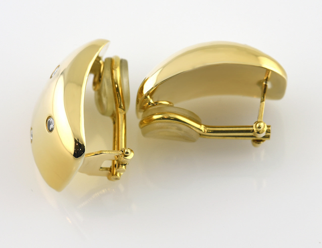 Ohrringe Clip 750/000 18 K Gelbgold, 8 Diamanten zus. 0,24 ct