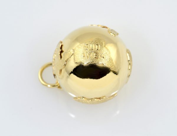 Pendentif globe terrestre 585/000 en or jaune 14 carats