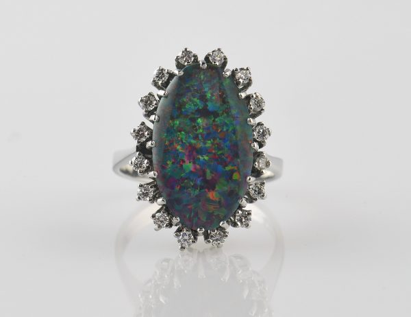Ring Opal Triplette 585/000 14 K Weißgold, 16 Diamanten zus. 0,45 ct