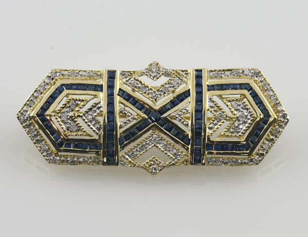 Broche Saphir en or jaune 585 14 carats, 42 diamants totalisant 0,50 ct