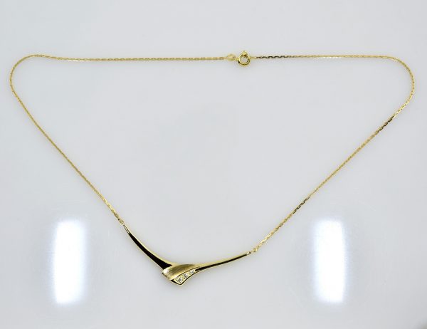 Kette 585/000 14 K Gelbgold Collier 3 Brillanten zus. 0,08 ct, 42 cm lang