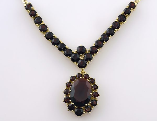 Kette Granat 333/000 8 K Gelbgold Collier, 42 cm lang