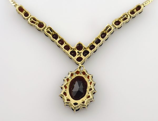 Kette Granat 333/000 8 K Gelbgold Collier, 42 cm lang