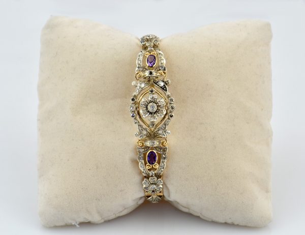 Armreif 750/000 Gelbgold und 925/000 Silber, 59 Diamanten zus. 0,75 ct, Amethyst