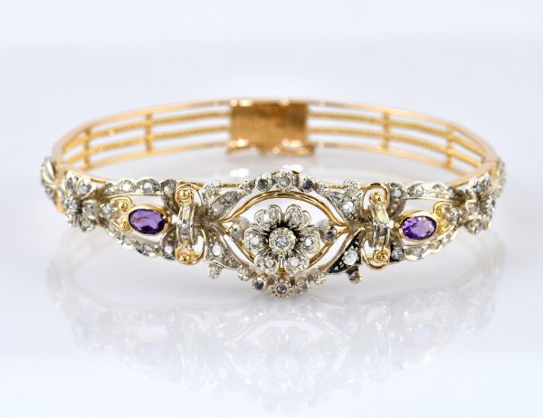 Armreif 750/000 Gelbgold und 925/000 Silber, 59 Diamanten zus. 0,75 ct, Amethyst