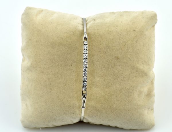 Armreif 585/000 14 K Weißgold 11 Brillanten zus. 0,75 ct