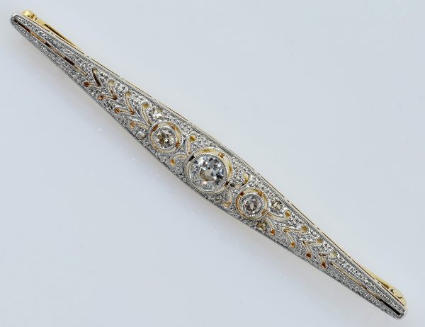 Antike Brosche 750/000 18 K Gelbgold, 900/000 Platin 7 Diamanten zus. 0,50 ct