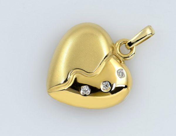Anhänger Herz 333/000 8 K Gelbgold 3 Diamanten zus. 0,02 ct