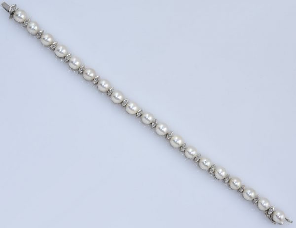 Perlen Armband 750/000 18 K Weißgold 19 Diamanten zus. 0,38 ct