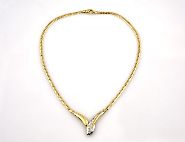 Kette 585/000 14 K Gelbgold Collier 7 Brillanten zus. 0,15 ct, 46 cm lang