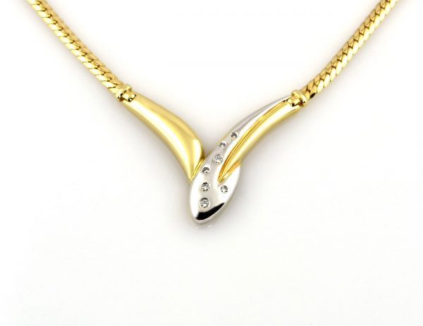 Kette 585/000 14 K Gelbgold Collier 7 Brillanten zus. 0,15 ct, 46 cm lang