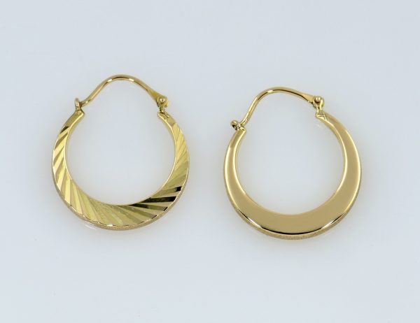 Boucles d'oreilles créoles en or jaune 333/000 8 K