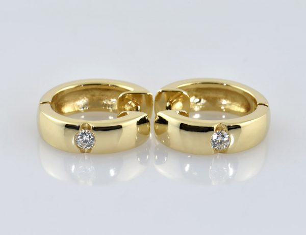 Creolen 585/000 14 K Gelbgold 2 Diamanten zus. 0,17 ct