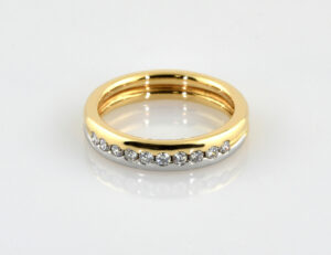 Diamant Ring Memory 750/000 18 K Gelb-/ Weißgold 10 Brillanten zus. 0,30 ct