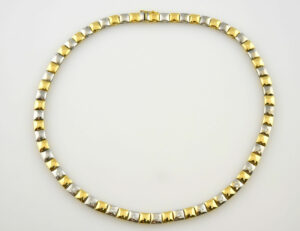 Collier 750/000 18 K Gelb-/Weißgold, 13 Brillanten zus. 0,57 ct, Länge 43,50 cm