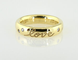Diamantring "love" 585/000 14 K Gelbgold 4 Brillanten zus. 0,08 ct