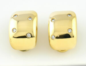Ohrringe Clip 750/000 18 K Gelbgold, 8 Diamanten zus. 0,24 ct