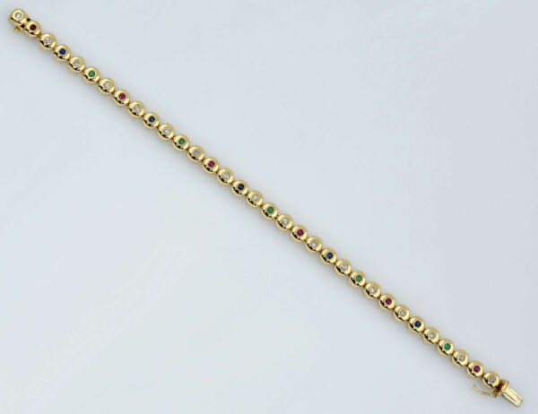 Armband 585/000 14 K Gelbgold 17 Diamanten zus. 0,52 ct, Rubin, Saphir, Smaragd