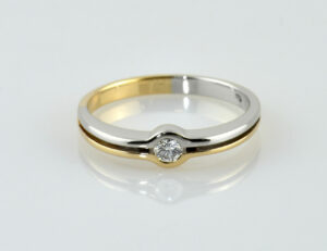 Diamant Solitär Ring 585/000 14 K Gelb-/ Weißgold Brillant 0,10 ct