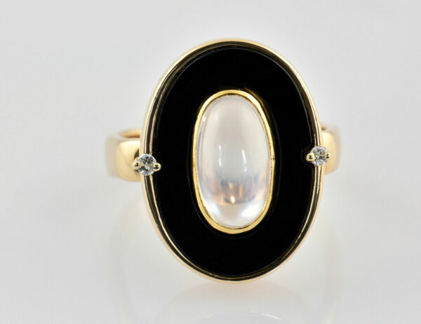 Ring Mondstein, Onyx 750/000 18 K Gelbgold, Brilianten zus. 0,04 ct