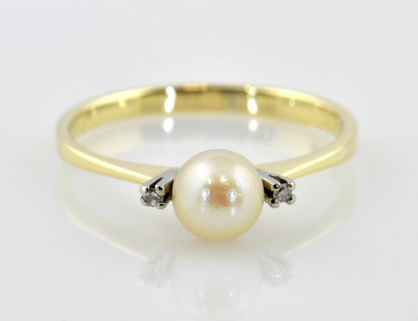 Ring Perle, Diamant 585/000 14 K Gelbgold, 2 Diamanten zus. 0,02 ct